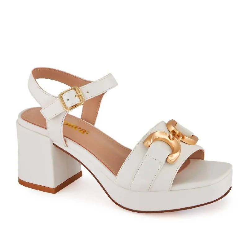 Women's Strappy Gladiator Sandals with Buckle Closures in Tan for a Boho LookWomen's High Heel Ankle Strap Sandal In White